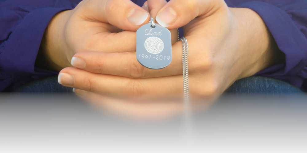 Hands holding Memory Tag made by Eternity's Touch