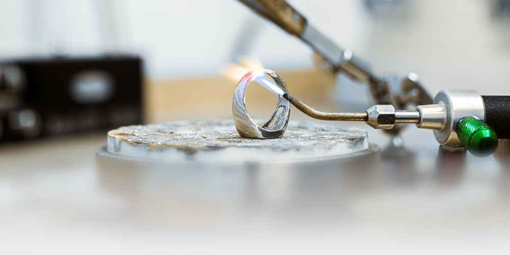 A ring being sized and finished to user specifications