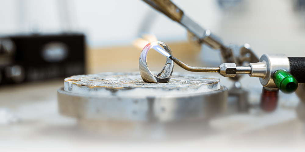 A ring being sized and finished to user specifications